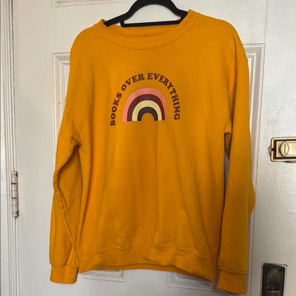 Yellow Crewneck Sweater with Retro Rainbow Design